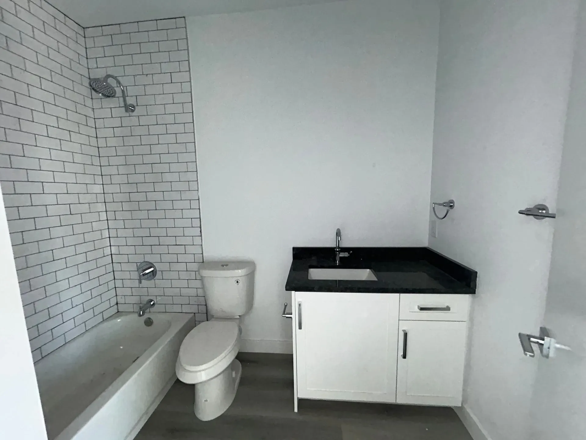 New bathroom build-out with tub, toilet, and vanity plumbed by KCM Mechanical in Scottsdale