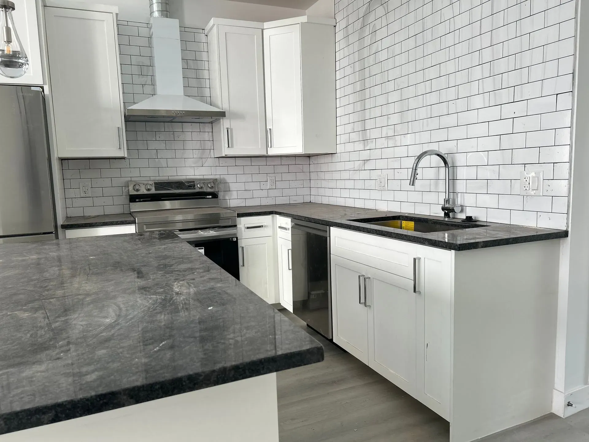 Finished kitchen remodel with new sink and faucet installed by KCM Mechanical in Scottsdale